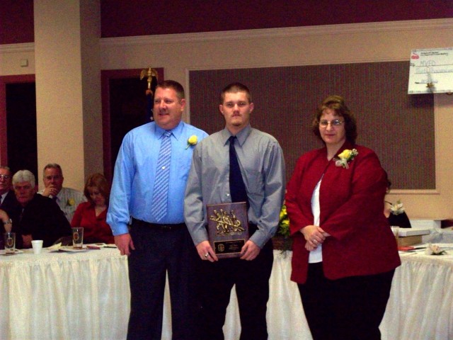 Junior Firefighter of the Year Andrew McHone with Chief Craig and Assistant Chief Raley.